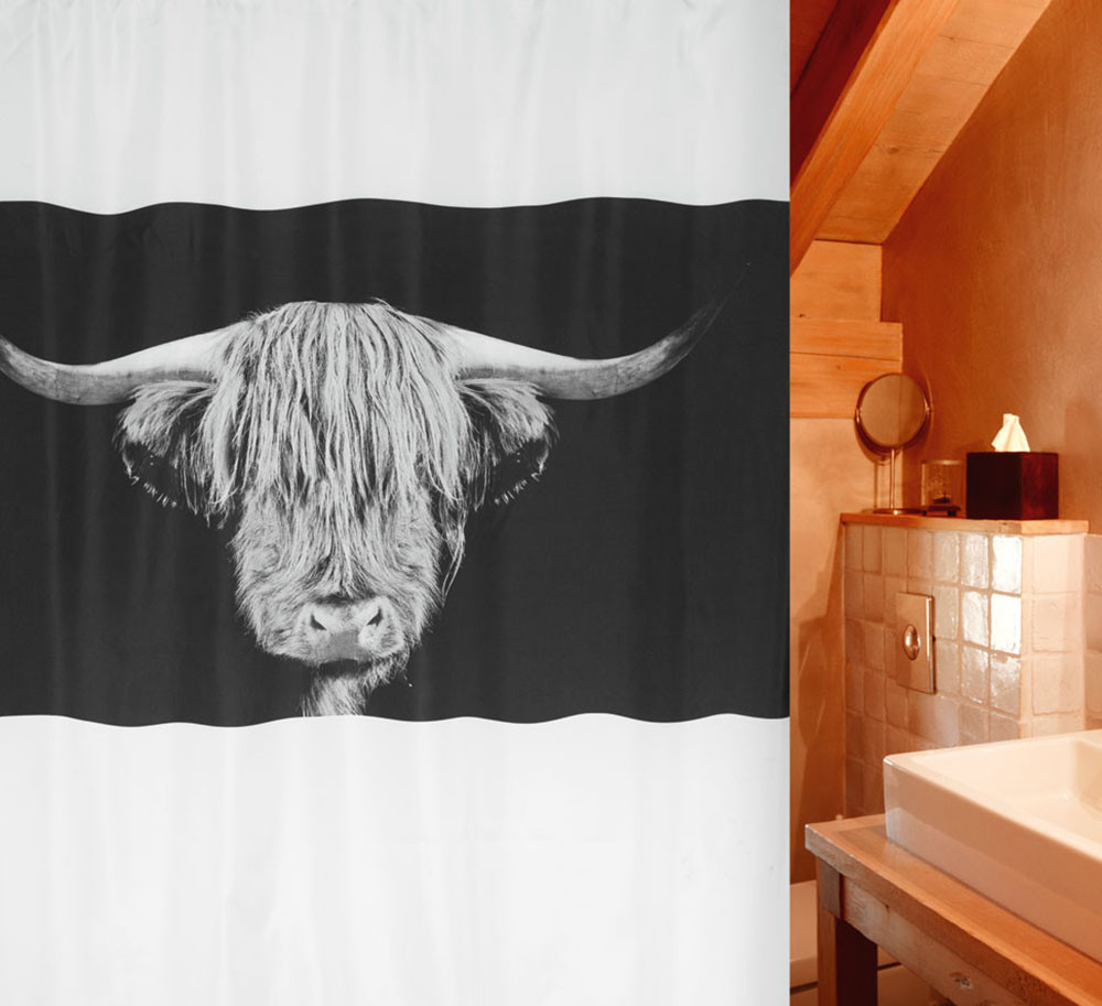 Cortina baño textil bufalo vaca blanco y negro.